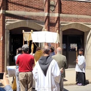 The Eucharist at the entrance of the Church